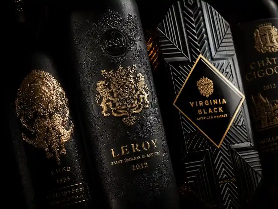 Embossed metallic foil labels